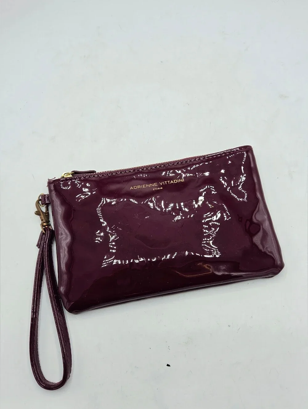 Adrienne Vittadini Burgundy Patent Leather Charging Wristlet Power Bank Clutch